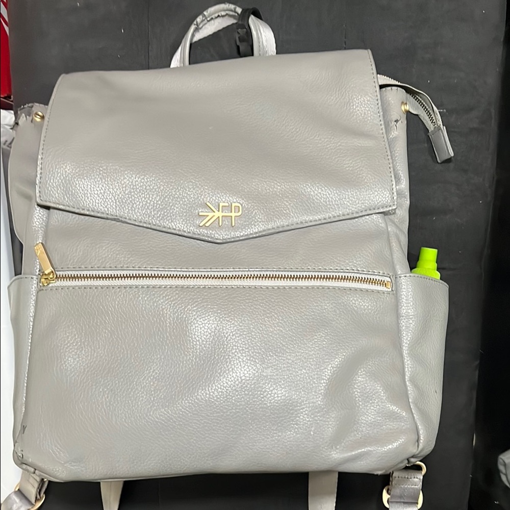 Gray Leather Backpack with Gold Accents